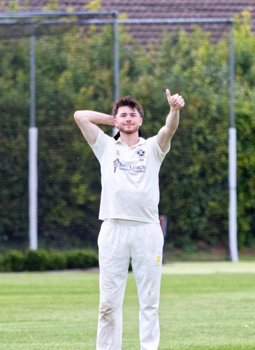 Ben Kavanagh giving a thumbs up on the pitch in his Histon CC whites